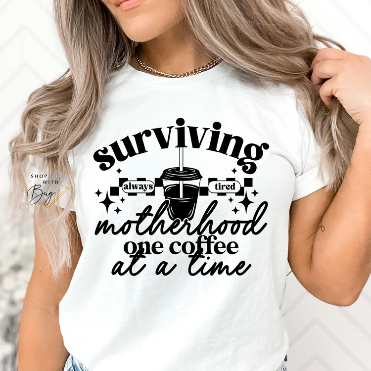 Surviving Motherhood One Coffee at a Time Adult Shirt